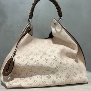 Louis Vuitton Mahina Hobo.